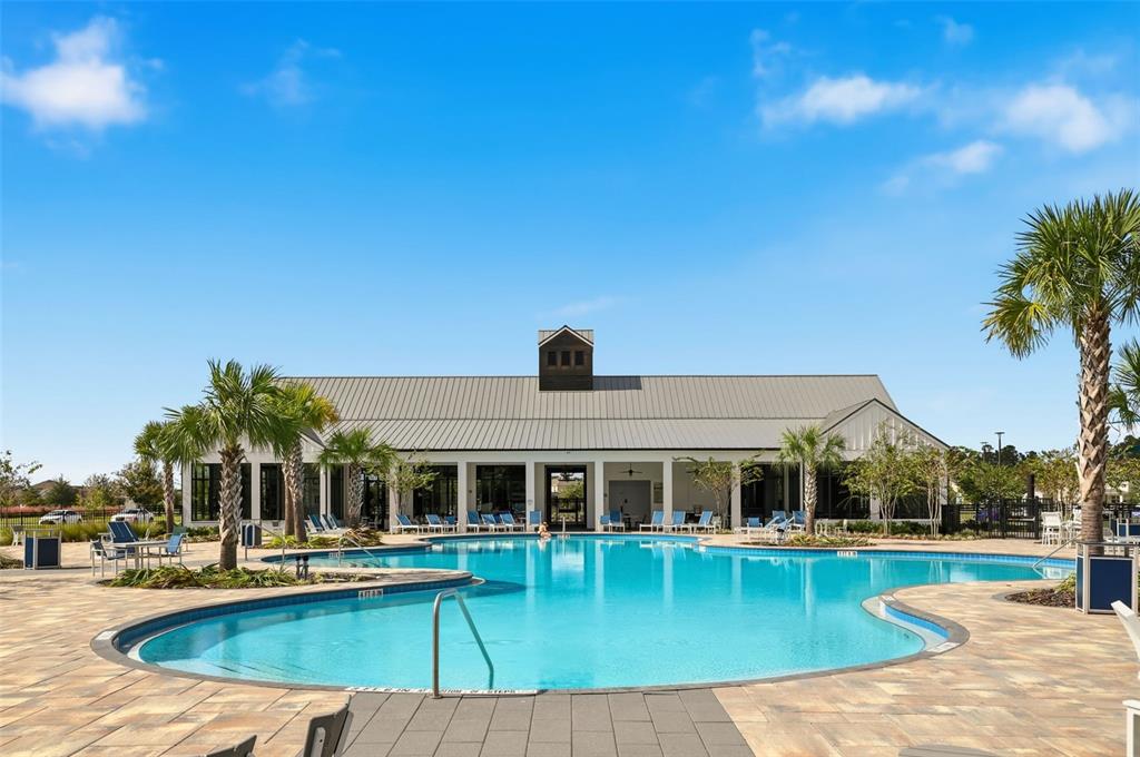 6777 Huntleigh Hammock Road Harmony, FL 34773 - Photo 30 of 32 swimming pool view with a outdoor space