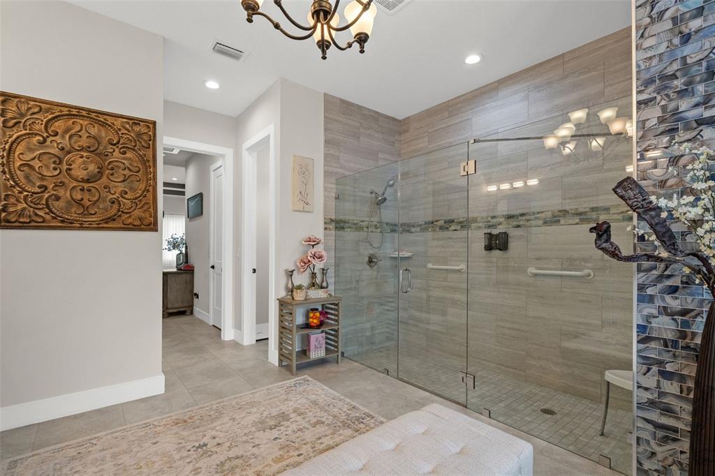 17601 Hanna Road Lutz, FL 33549 - Photo 28 of 48 a bathroom with a shower