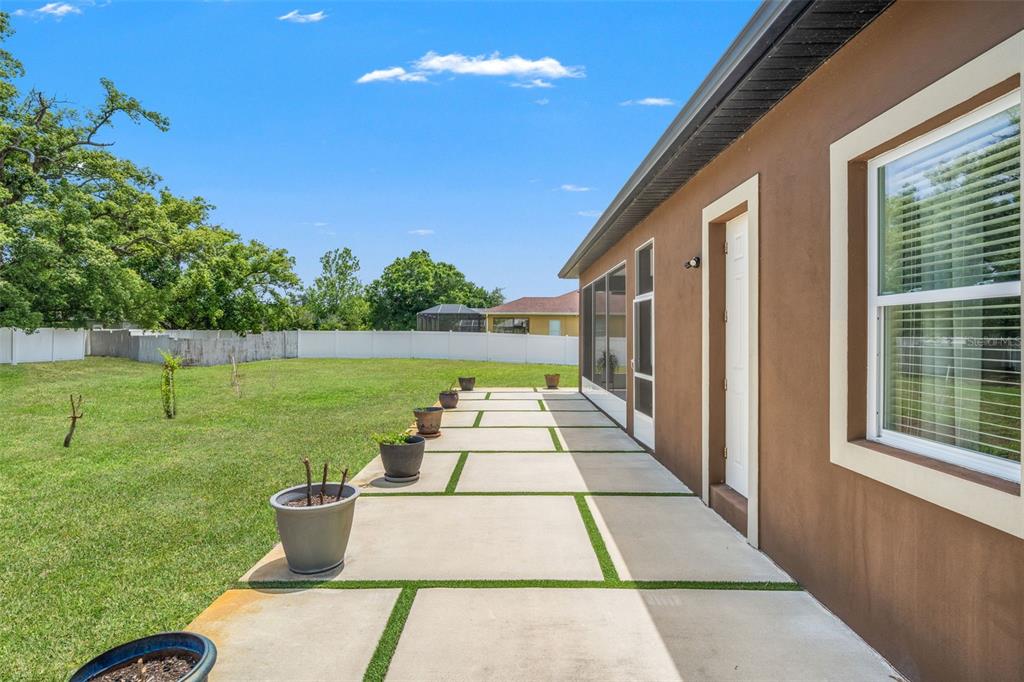17601 Hanna Road Lutz, FL 33549 - Photo 41 of 48 a view of swimming pool with a yard