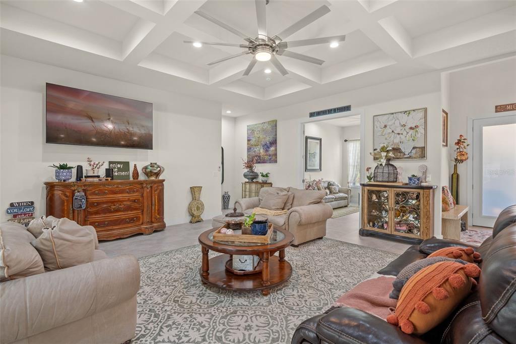 17601 Hanna Road Lutz, FL 33549 - Photo 10 of 48 a living room with furniture and a flat screen tv