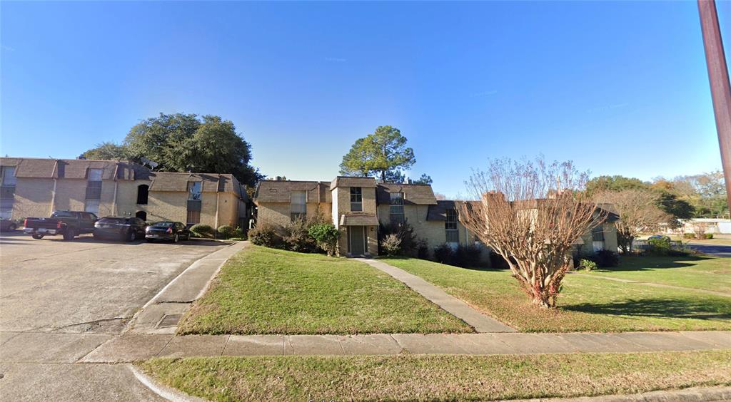 a view of a street in front of a building