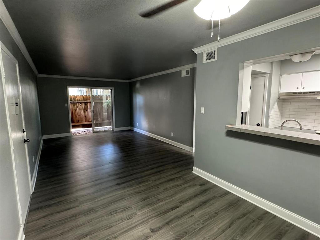 7000 Creswell Road, Unit 124 Shreveport, LA 71106 - Photo 3 of 18 a view of a hallway with wooden floor