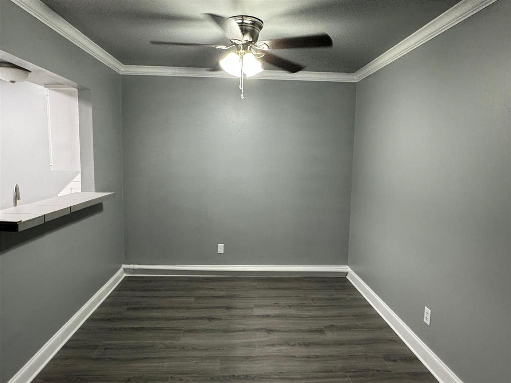 7000 Creswell Road, Unit 124 Shreveport, LA 71106 - Photo 8 of 18 a view of room with window and wooden floor