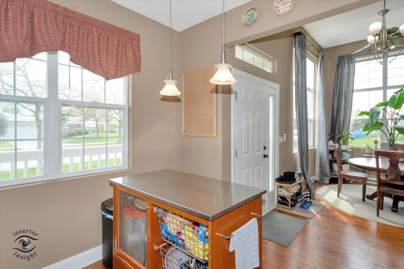 1366 Fox Hound Trail Beecher, IL 60401 - Photo 11 of 26 a living room with furniture a large window and wooden floor