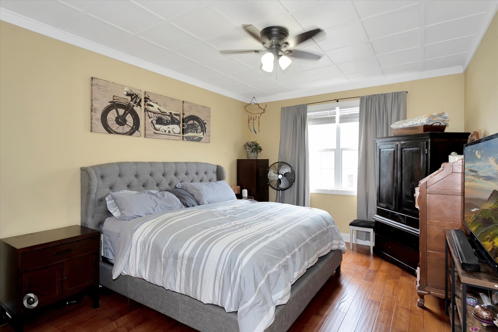 1366 Fox Hound Trail Beecher, IL 60401 - Photo 12 of 26 a bedroom with a bed and a chandelier