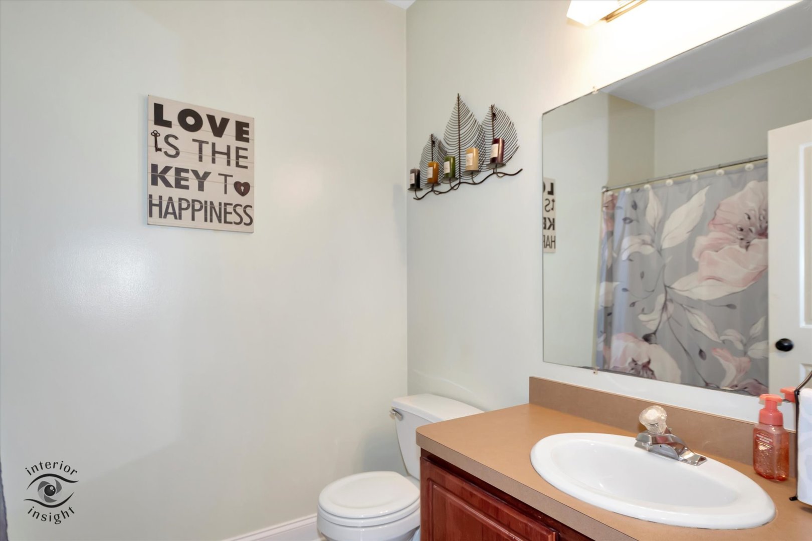 1366 Fox Hound Trail Beecher, IL 60401 - Photo 18 of 26 a bathroom with a sink a toilet and shower curtain