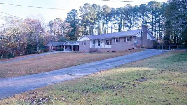 a view of house with a outdoor space