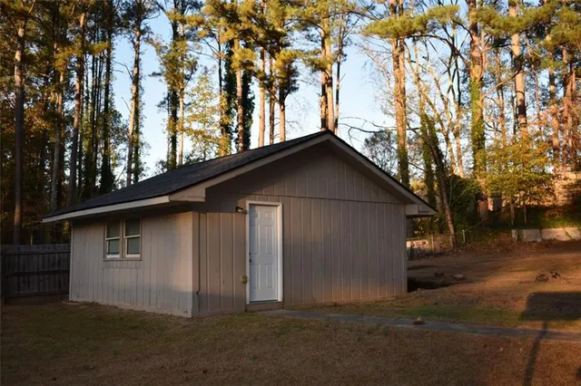a backyard of a house with lots of green space