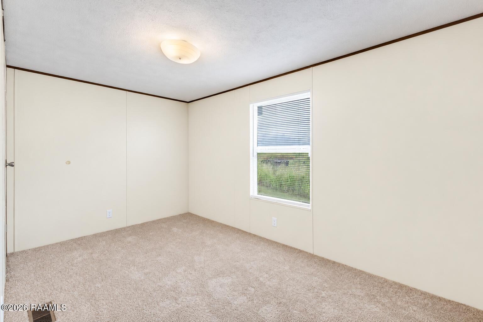 340 Tom Schexnader Road Opelousas, LA 70570 - Photo 9 of 16 Guest Bedroom