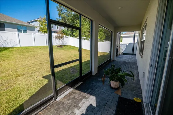 an aerial view of a house with a garden