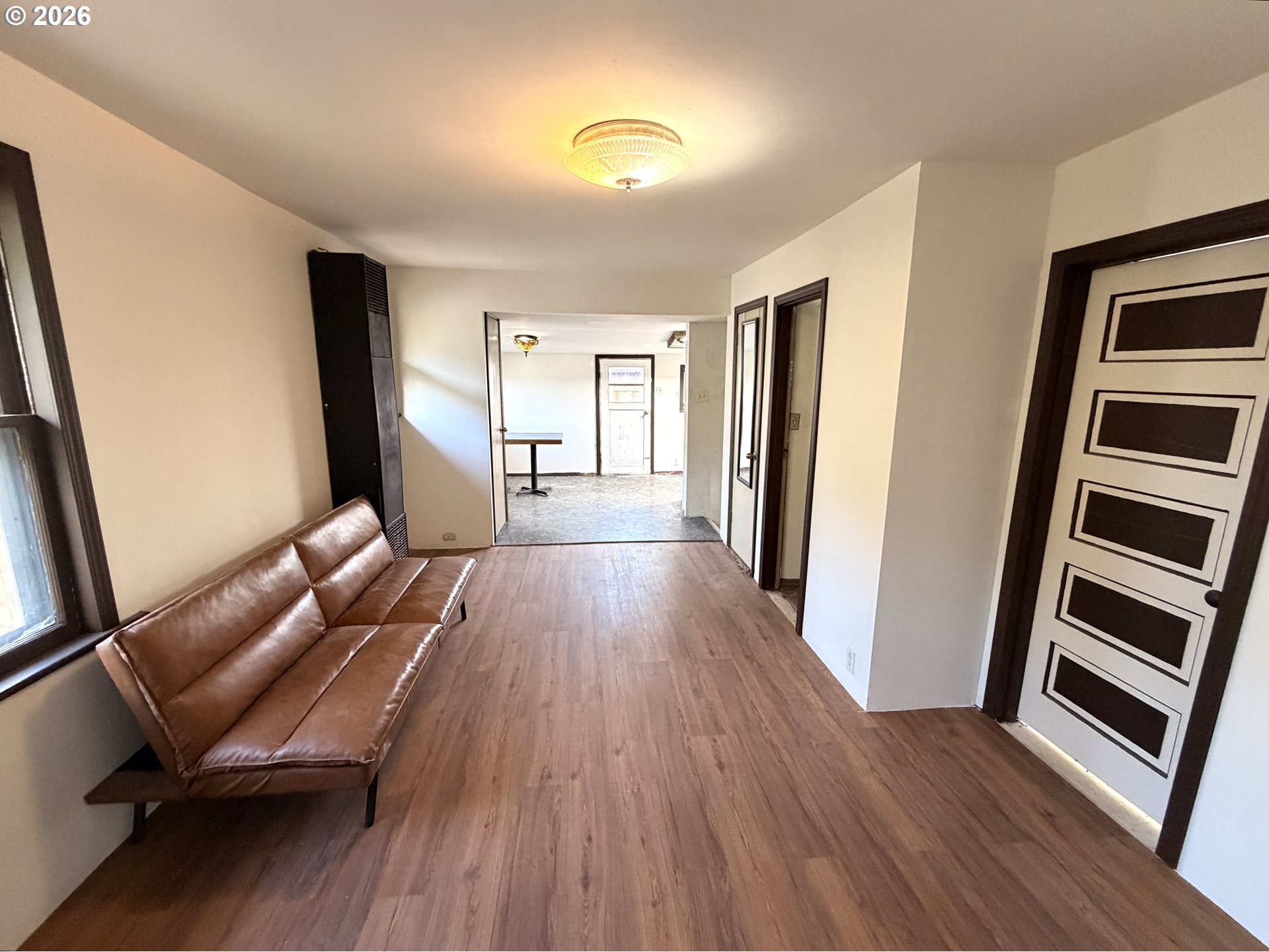 1207 10th Street La Grande, OR 97850 - Photo 3 of 13 a view of a room with wooden floor and staircase
