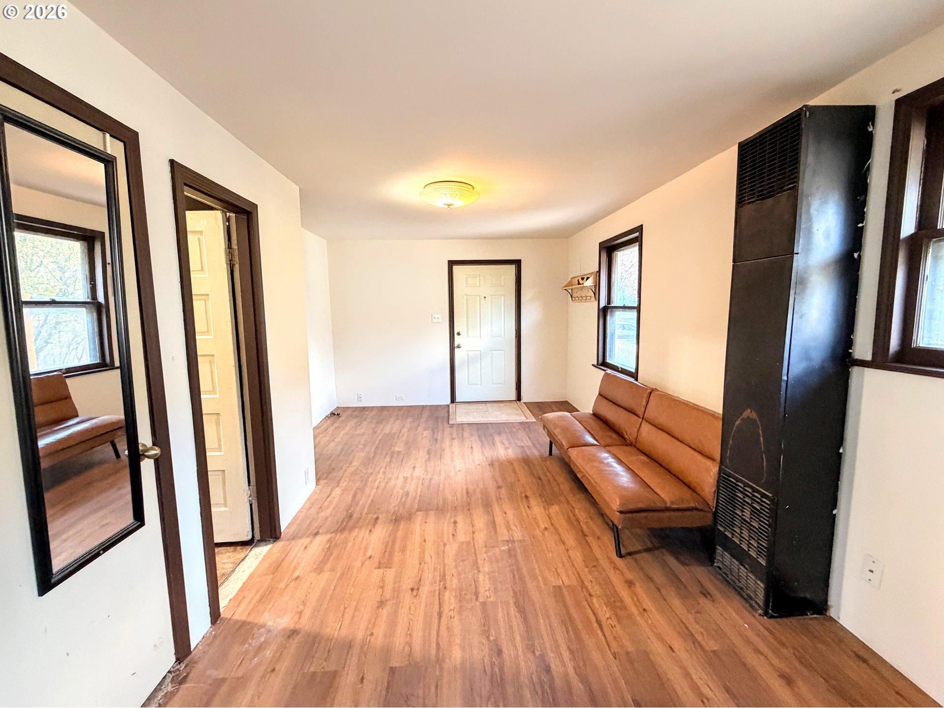 1207 10th Street La Grande, OR 97850 - Photo 4 of 13 a view of an empty room and wooden floor