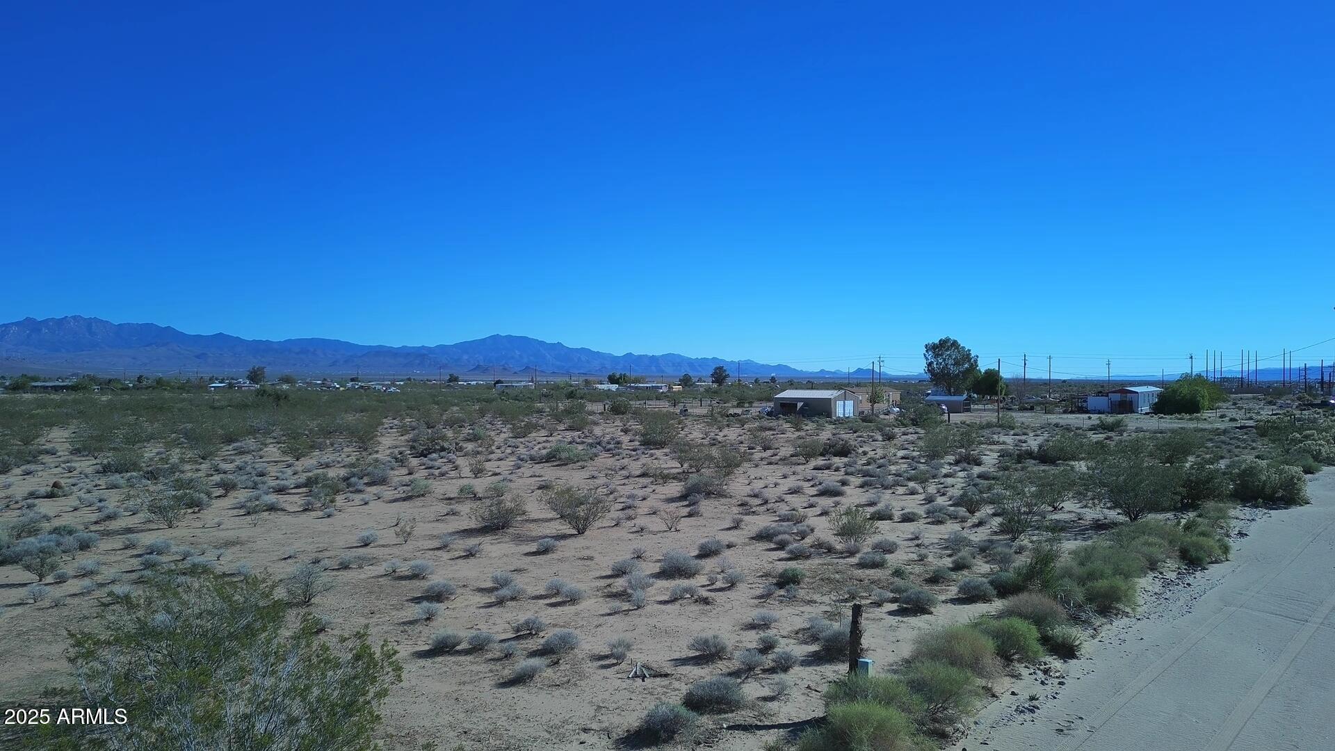 1152 Colorado Road Golden Valley, AZ 86413 - Photo 14 of 47 a view of a city with lush green forest