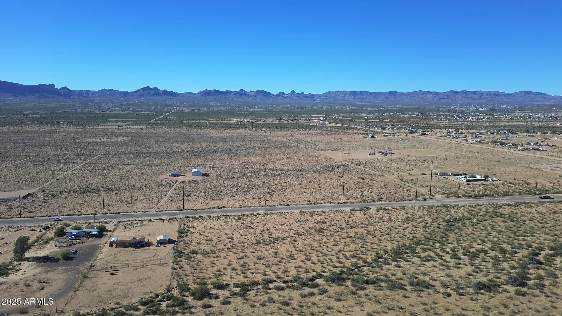 1152 Colorado Road Golden Valley, AZ 86413 - Photo 17 of 47 a view of a lake with a mountain