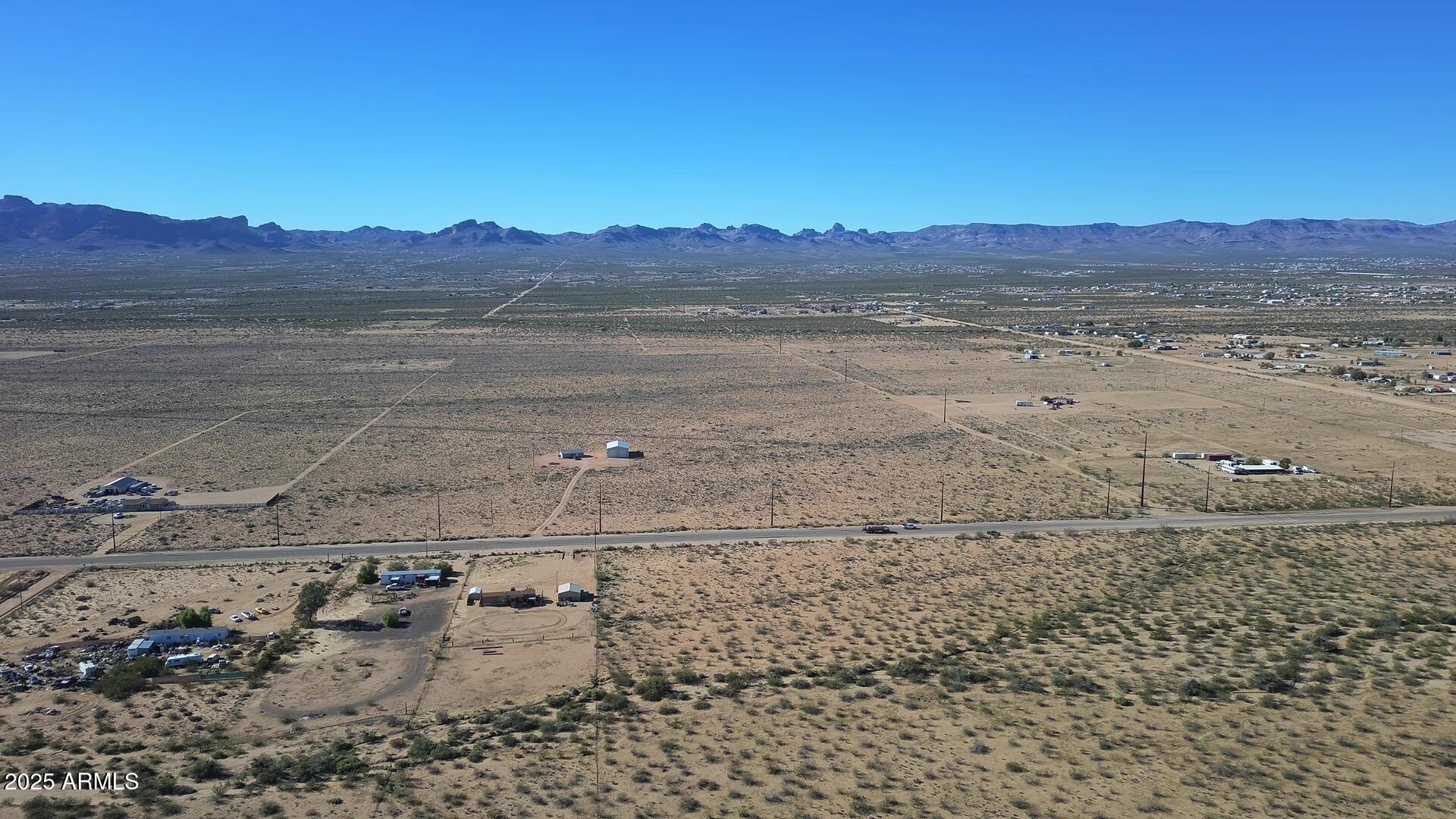 1152 Colorado Road Golden Valley, AZ 86413 - Photo 23 of 47 a view of a lake with a mountain