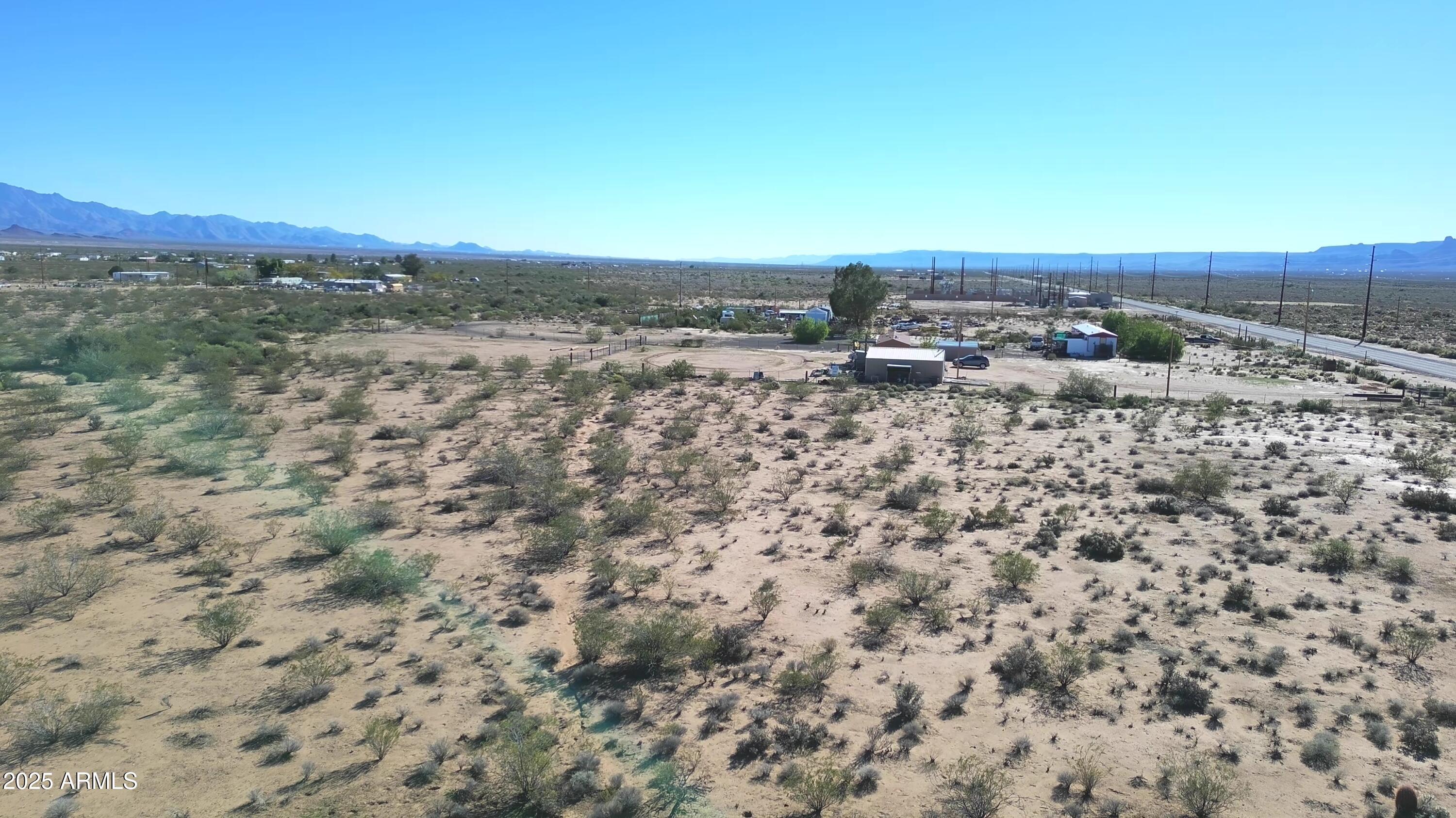 1152 Colorado Road Golden Valley, AZ 86413 - Photo 28 of 47 an aerial view of a house with a yard