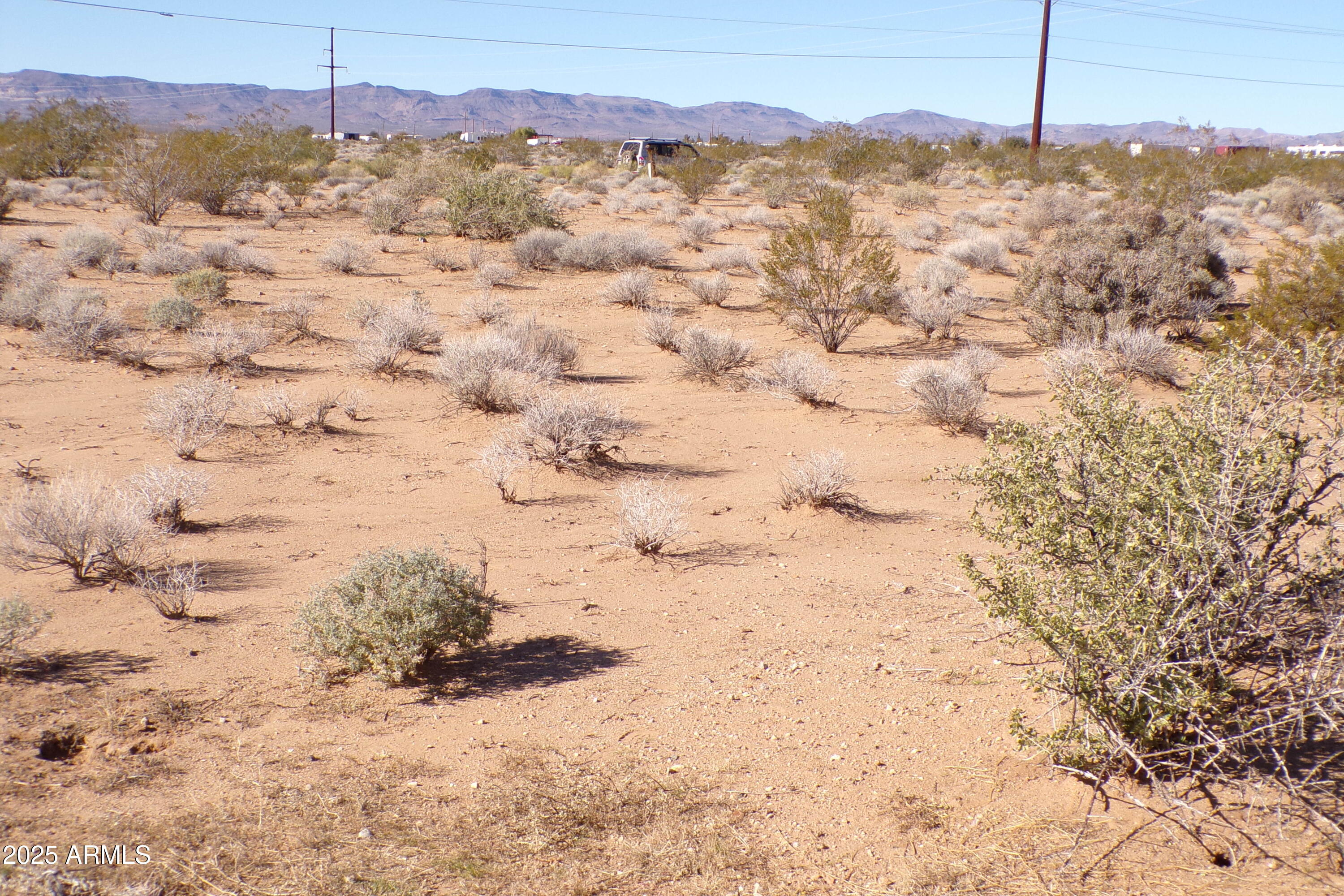 1152 Colorado Road Golden Valley, AZ 86413 - Photo 44 of 47 a view of a sky from a yard