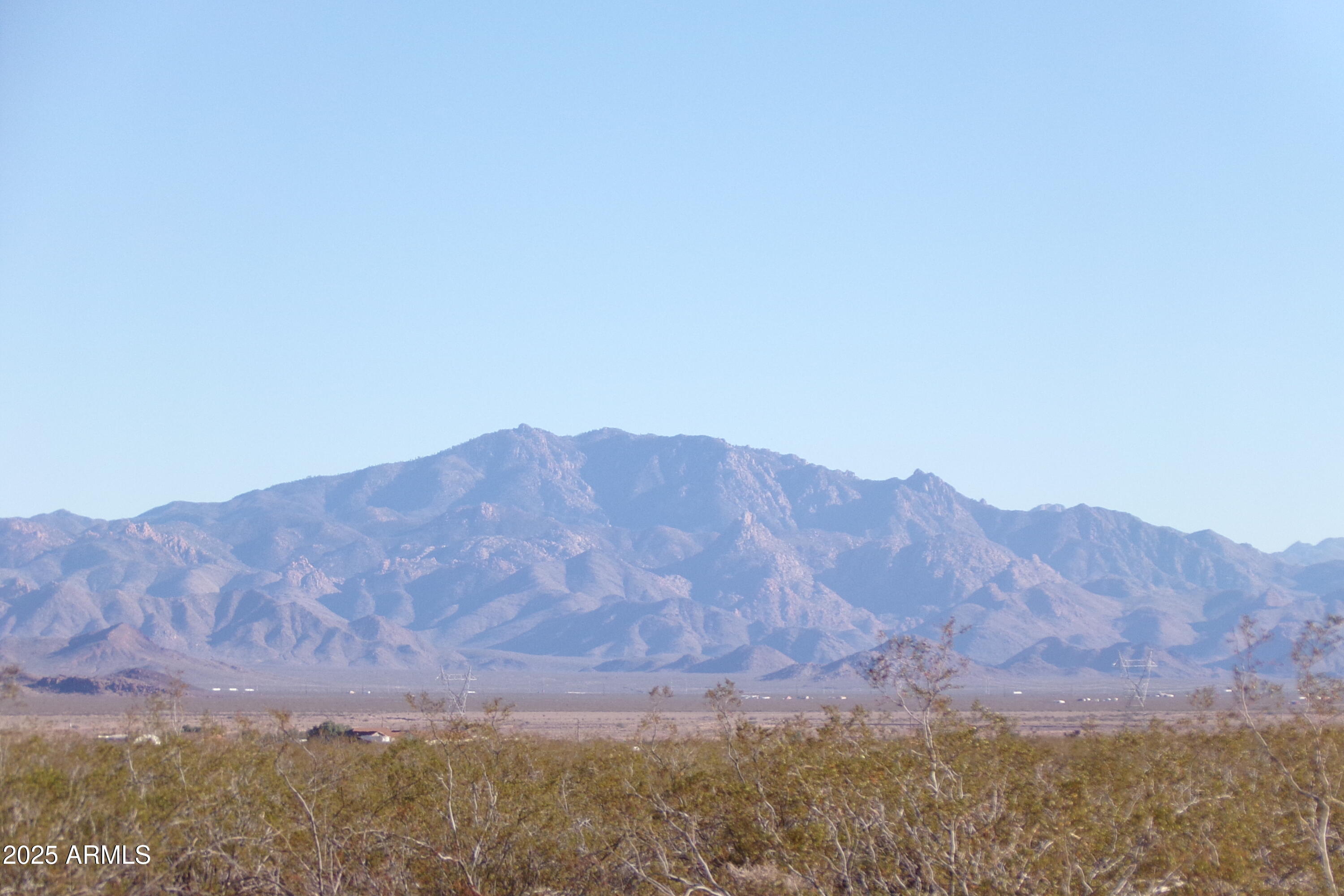 1152 Colorado Road Golden Valley, AZ 86413 - Photo 47 of 47 a view of a mountain range with trees in the background