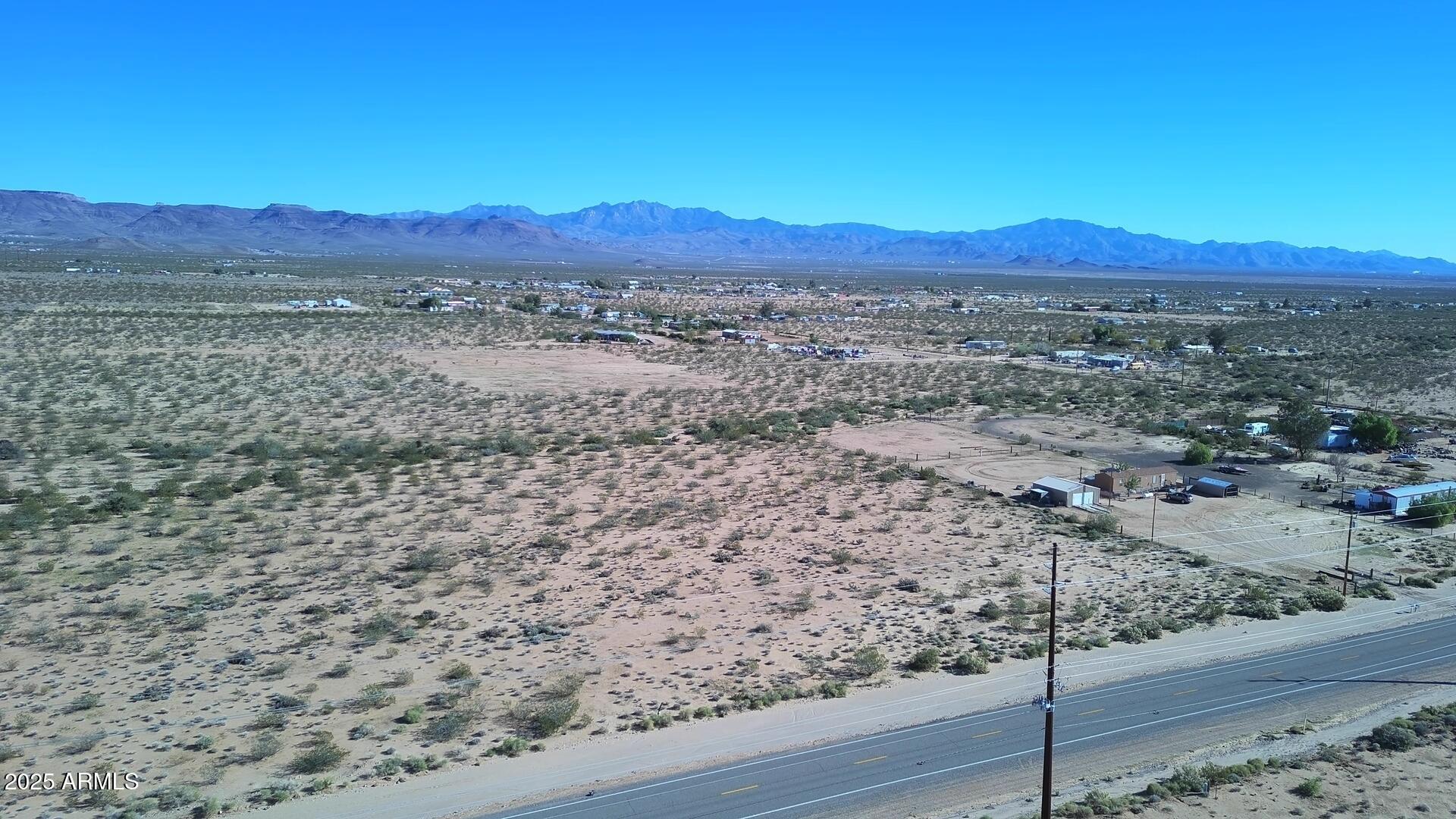 1152 Colorado Road Golden Valley, AZ 86413 - Photo 7 of 47 a view of an outdoor space and mountain view