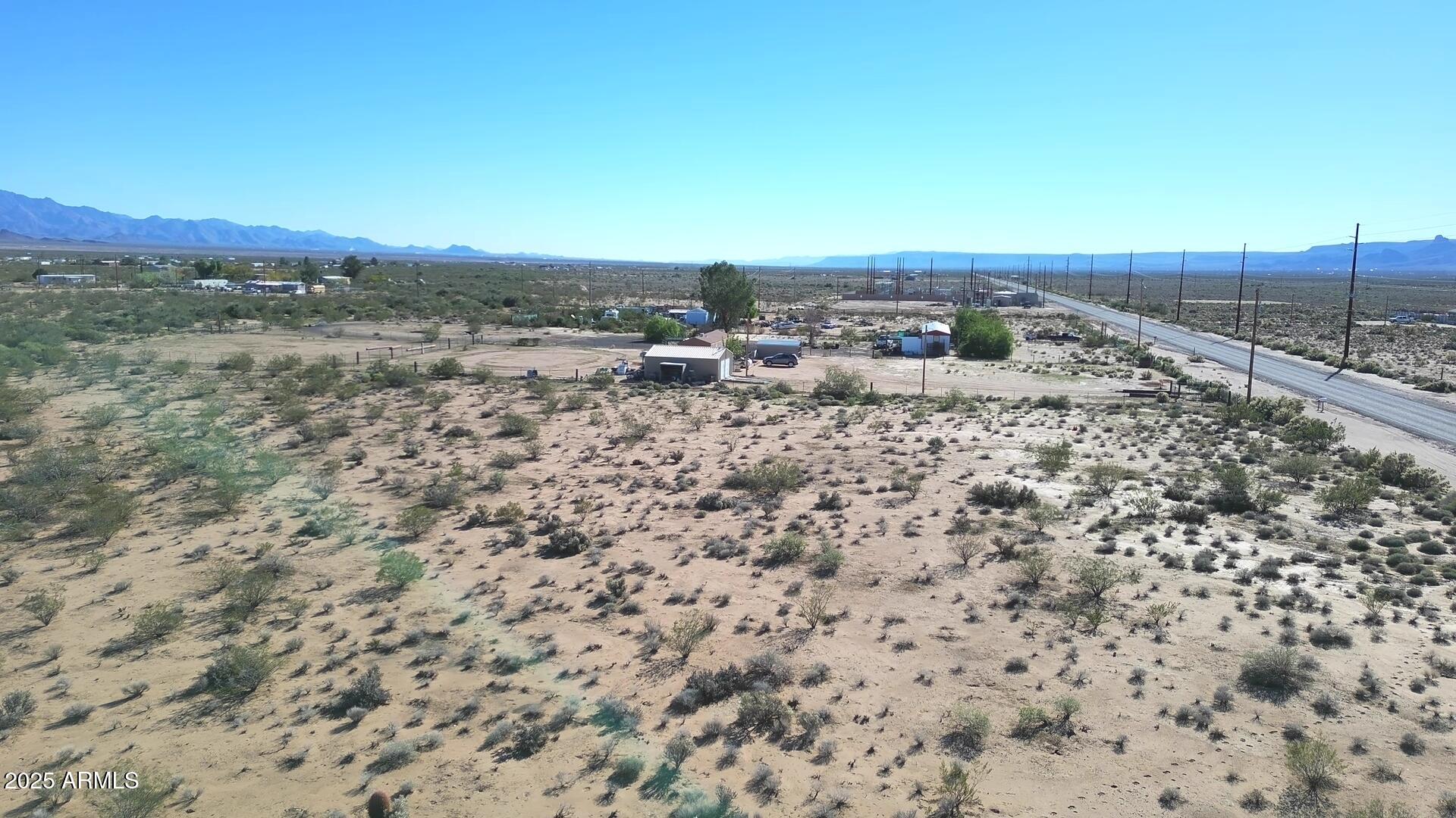 1152 Colorado Road Golden Valley, AZ 86413 - Photo 10 of 47 an aerial view of a house with a yard