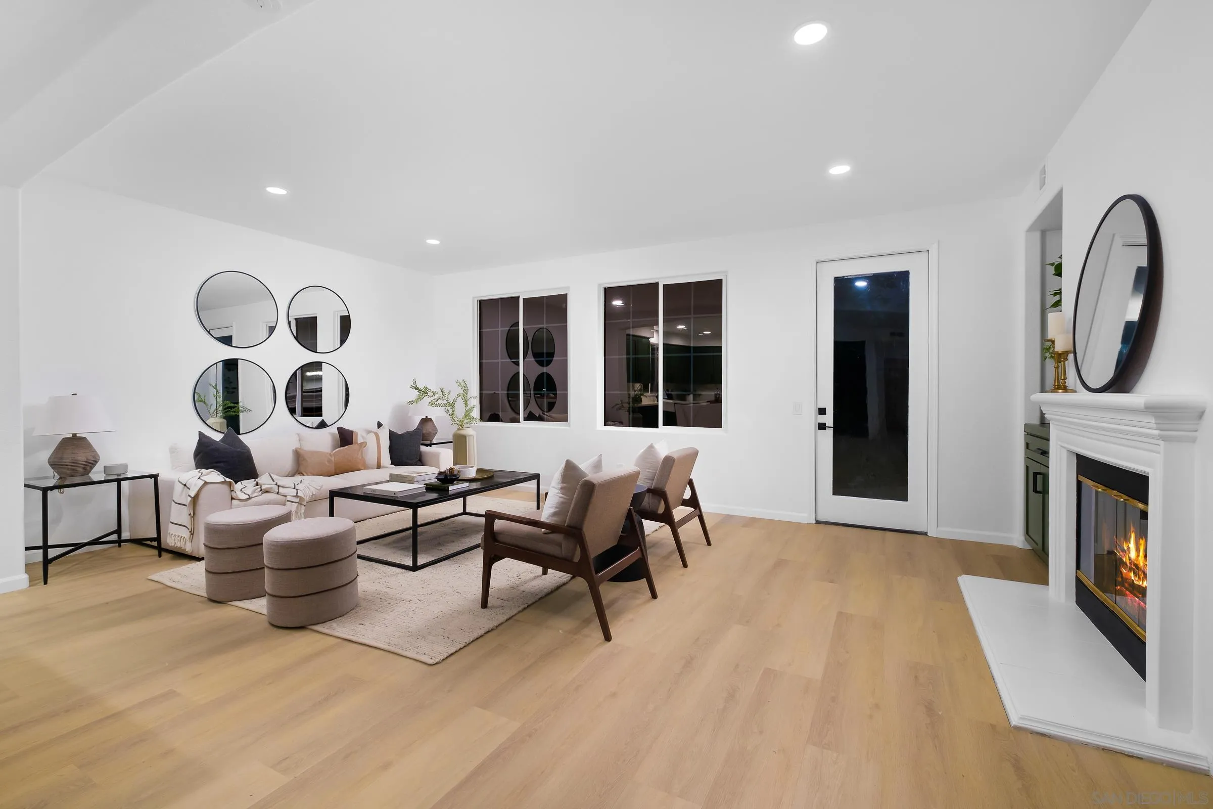 550 Echo Lane San Marcos, CA 92078 - Photo 17 of 51 a living room with fireplace furniture and a large window