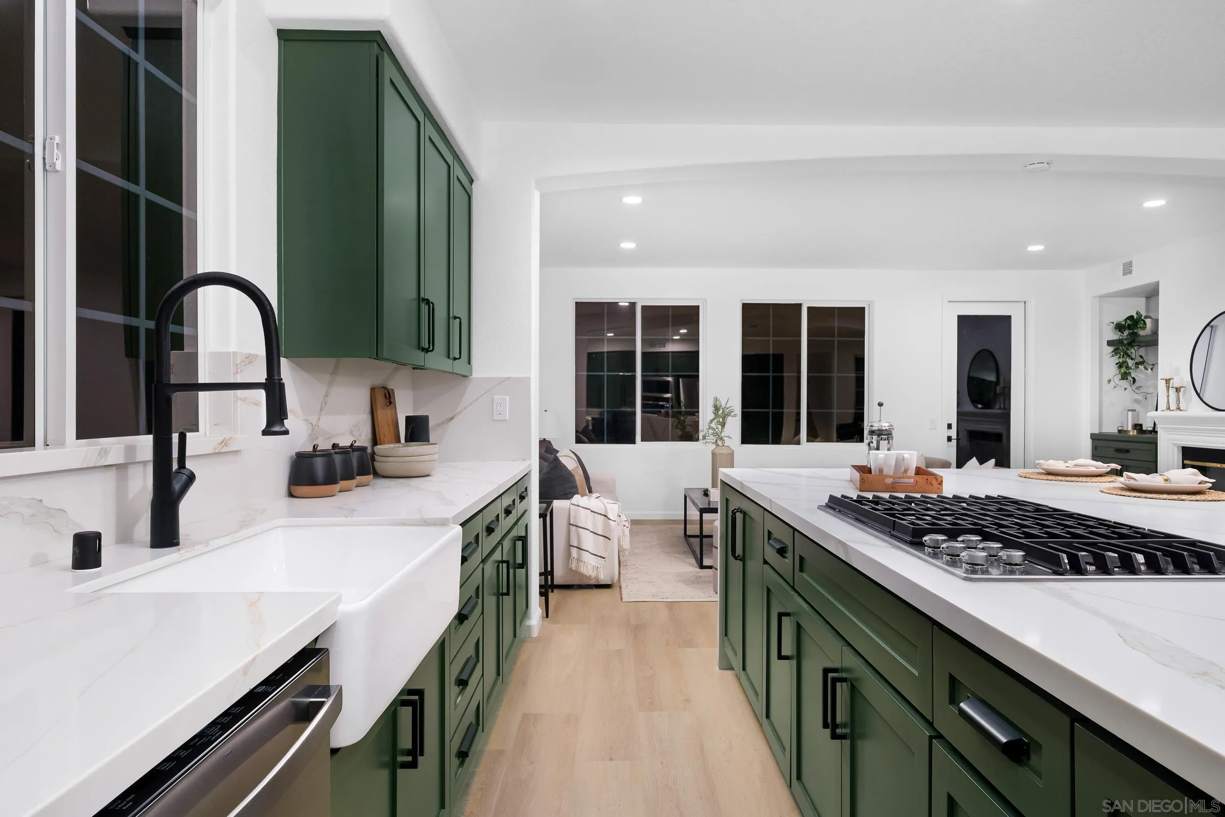550 Echo Lane San Marcos, CA 92078 - Photo 21 of 51 a kitchen with a sink and stove