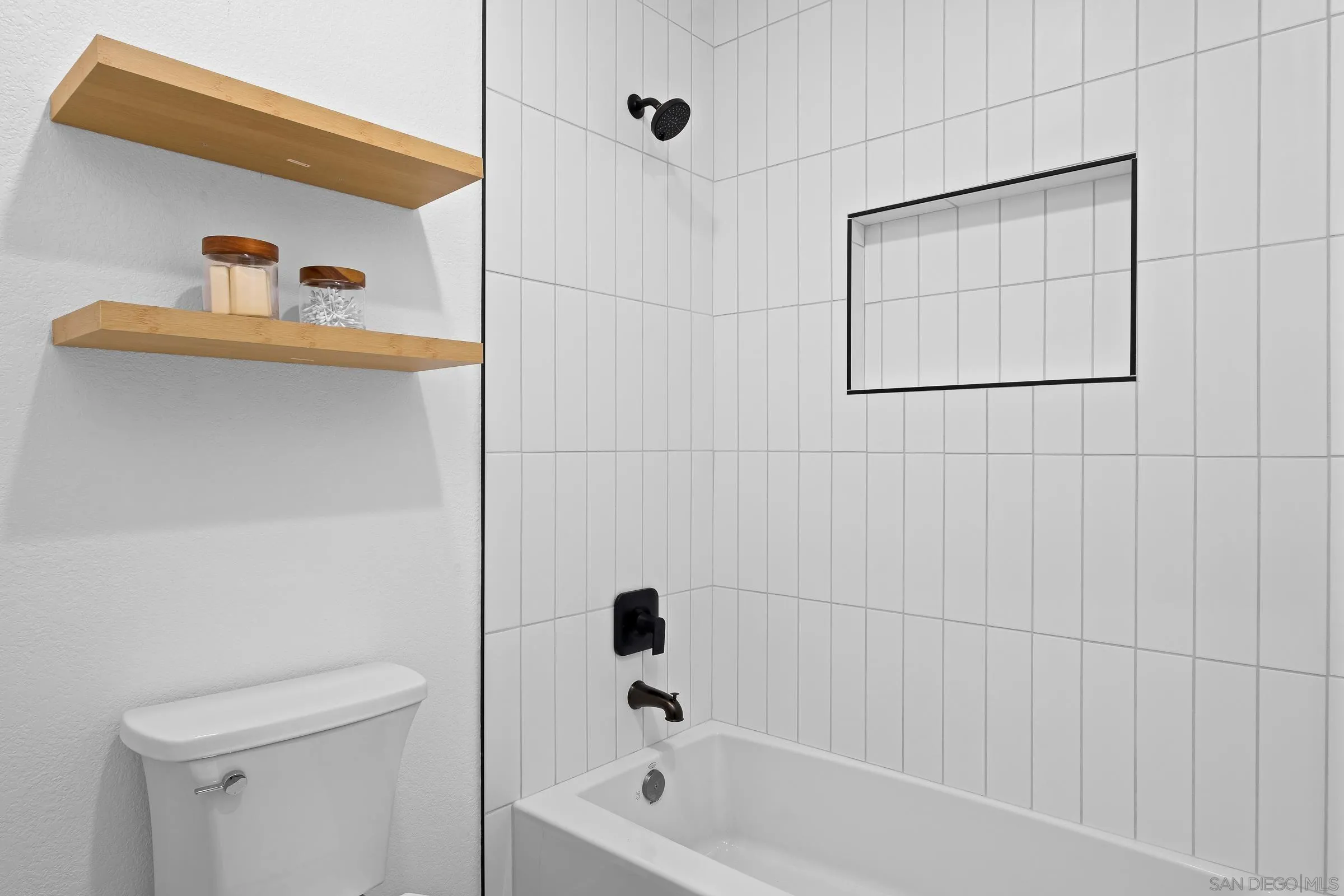 550 Echo Lane San Marcos, CA 92078 - Photo 23 of 51 a bathroom with a bathtub and a shower