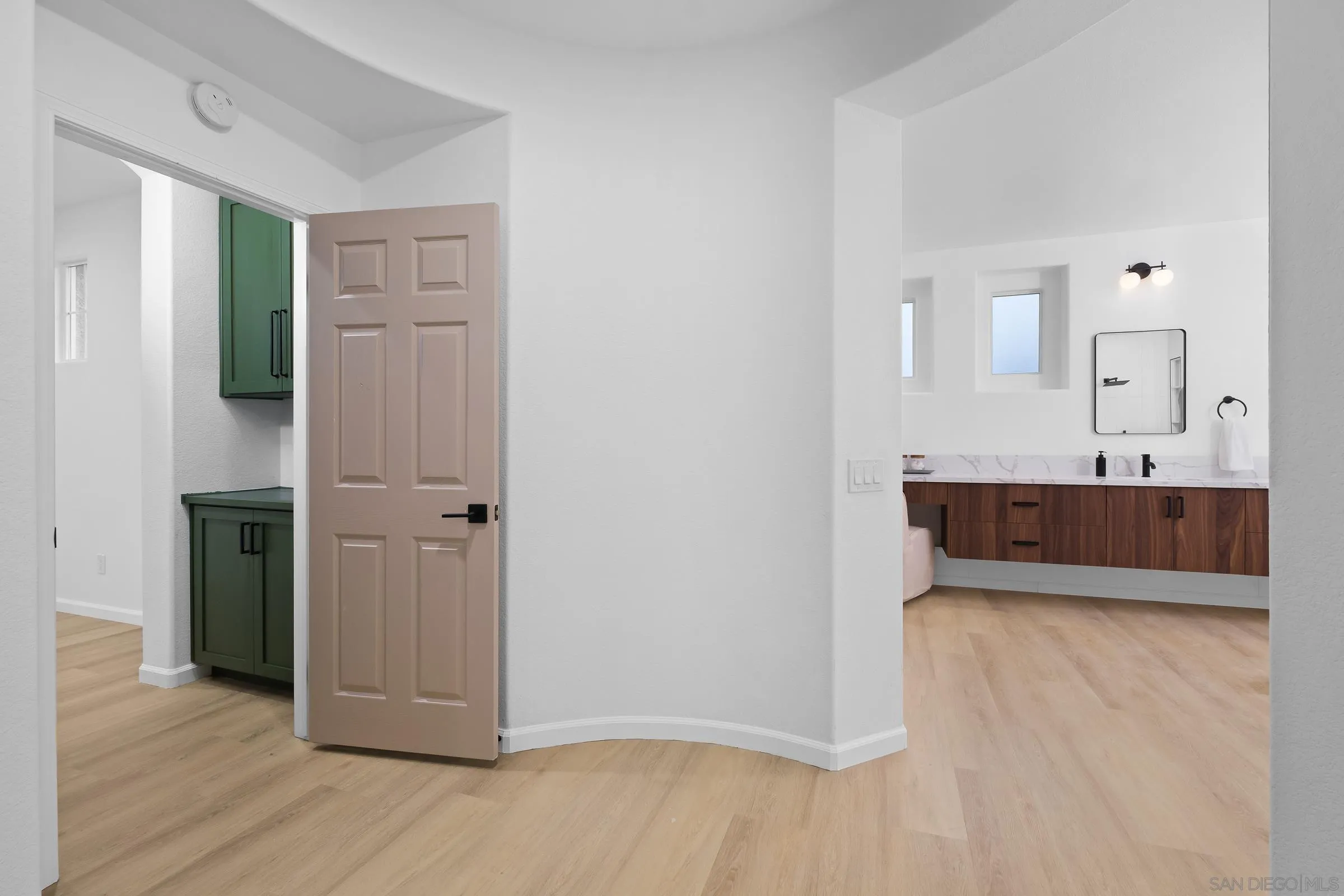 550 Echo Lane San Marcos, CA 92078 - Photo 30 of 51 a view of a bathroom from the hallway