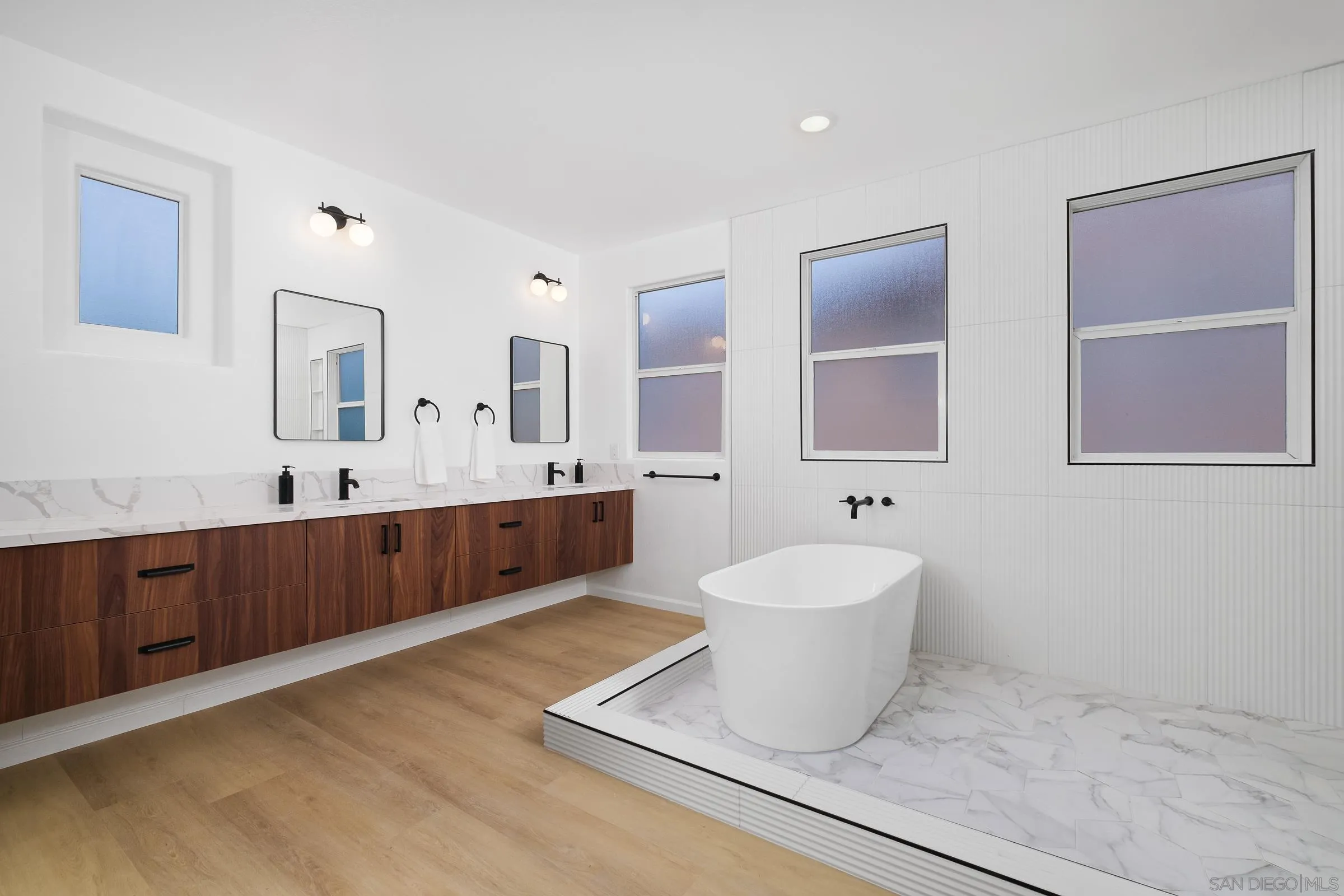 550 Echo Lane San Marcos, CA 92078 - Photo 31 of 51 a bathroom with a double vanity sink mirror and bathtub