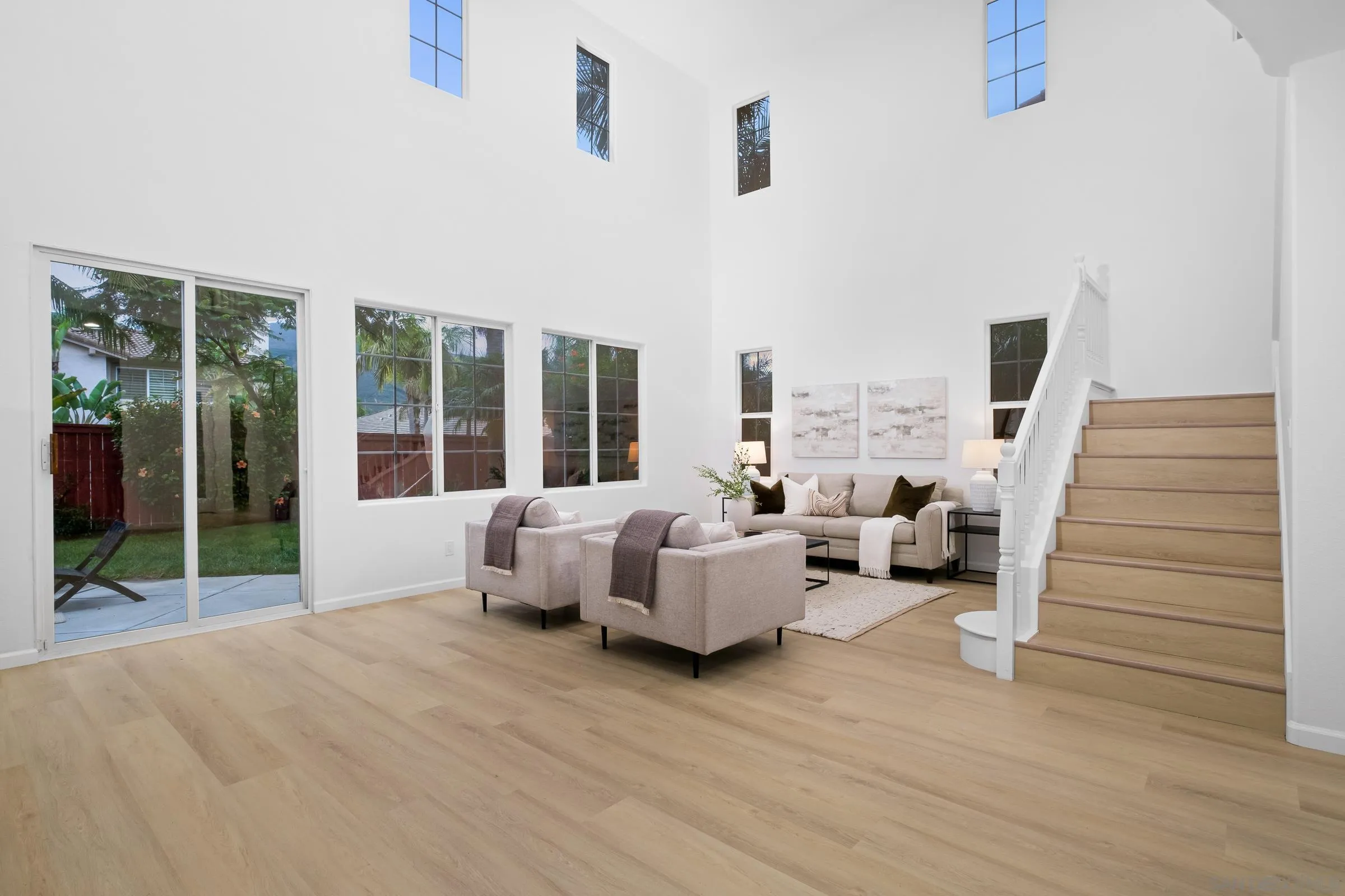 550 Echo Lane San Marcos, CA 92078 - Photo 35 of 51 a living room with furniture and large windows