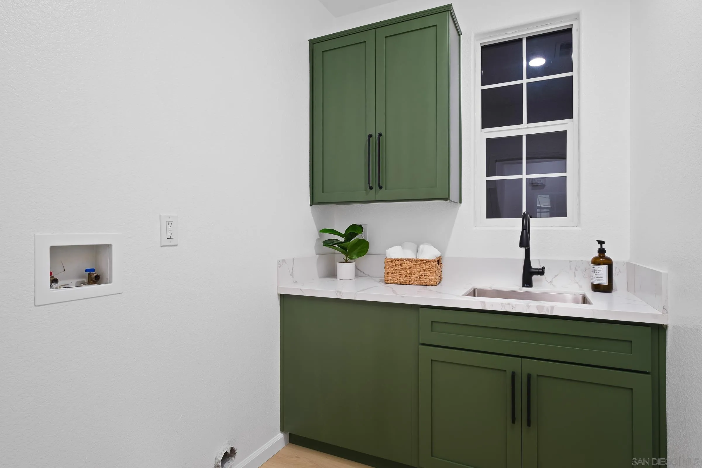 550 Echo Lane San Marcos, CA 92078 - Photo 37 of 51 a bathroom with a sink and a mirror