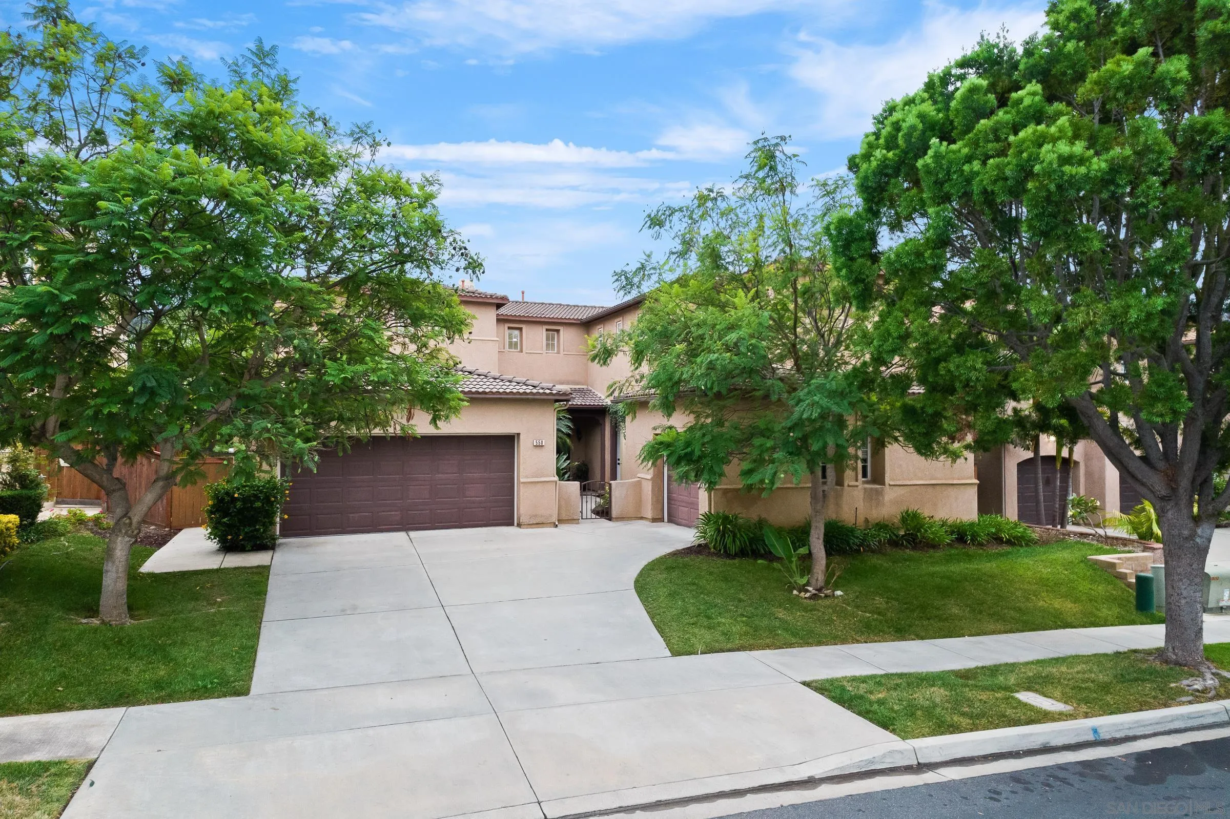 550 Echo Lane San Marcos, CA 92078 - Photo 47 of 51 a front view of a house with a yard
