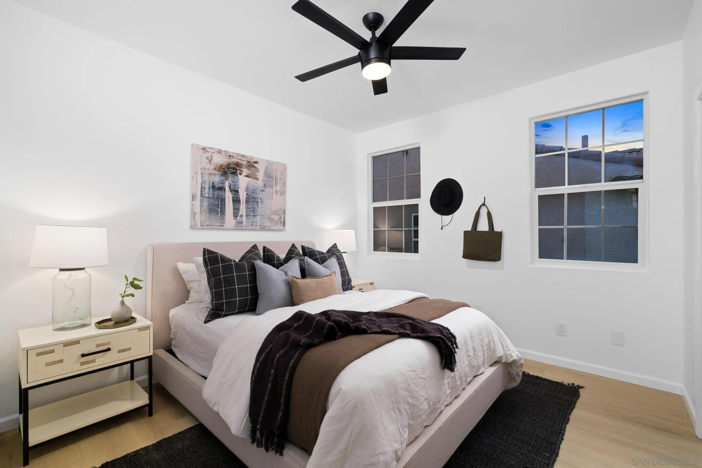 550 Echo Lane San Marcos, CA 92078 - Photo 9 of 51 a bedroom with a large bed and a window