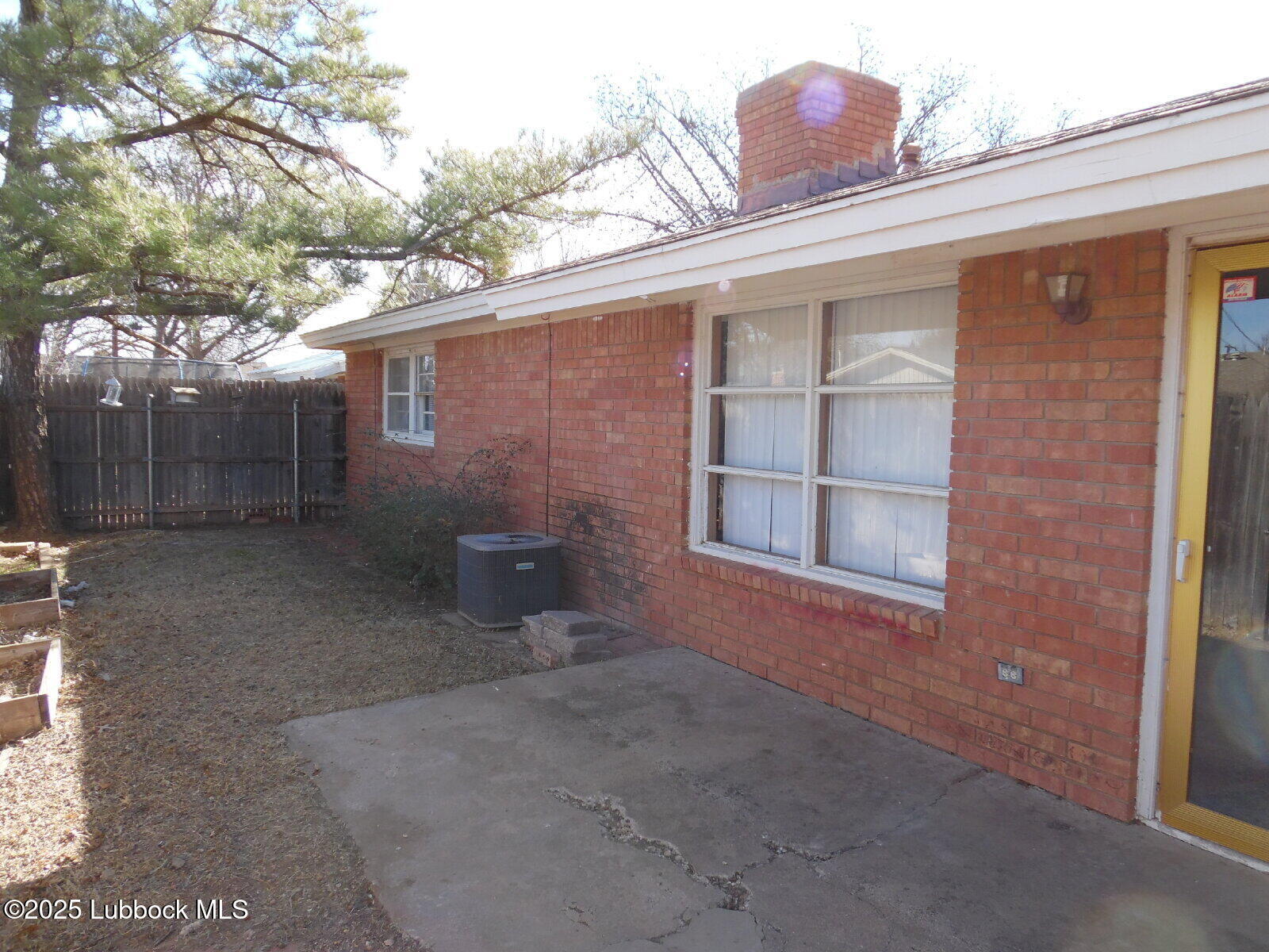 2008 54th Street Lubbock, TX 79412 - Photo 13 of 14 a backyard of a house