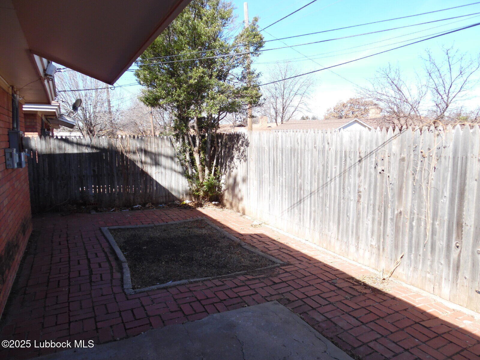 2008 54th Street Lubbock, TX 79412 - Photo 14 of 14 a view of a pathway with a wrought fence