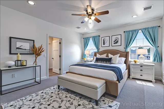 a bedroom with furniture and a window