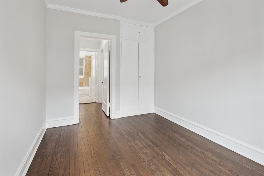 534 West Brompton Avenue, Unit 3N Chicago, IL 60657 - Photo 14 of 19 a view of a hallway with wooden floor
