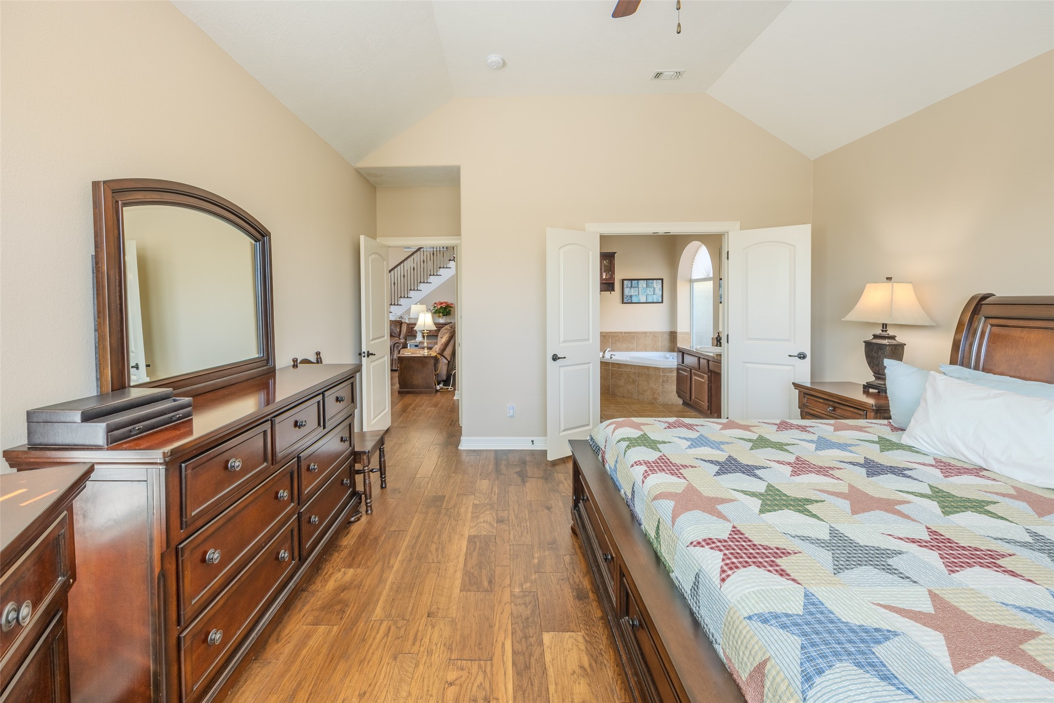 1905 Rosenbaum Drive Brenham, TX 77833 - Photo 19 of 30 a spacious bedroom with a bed and a dresser