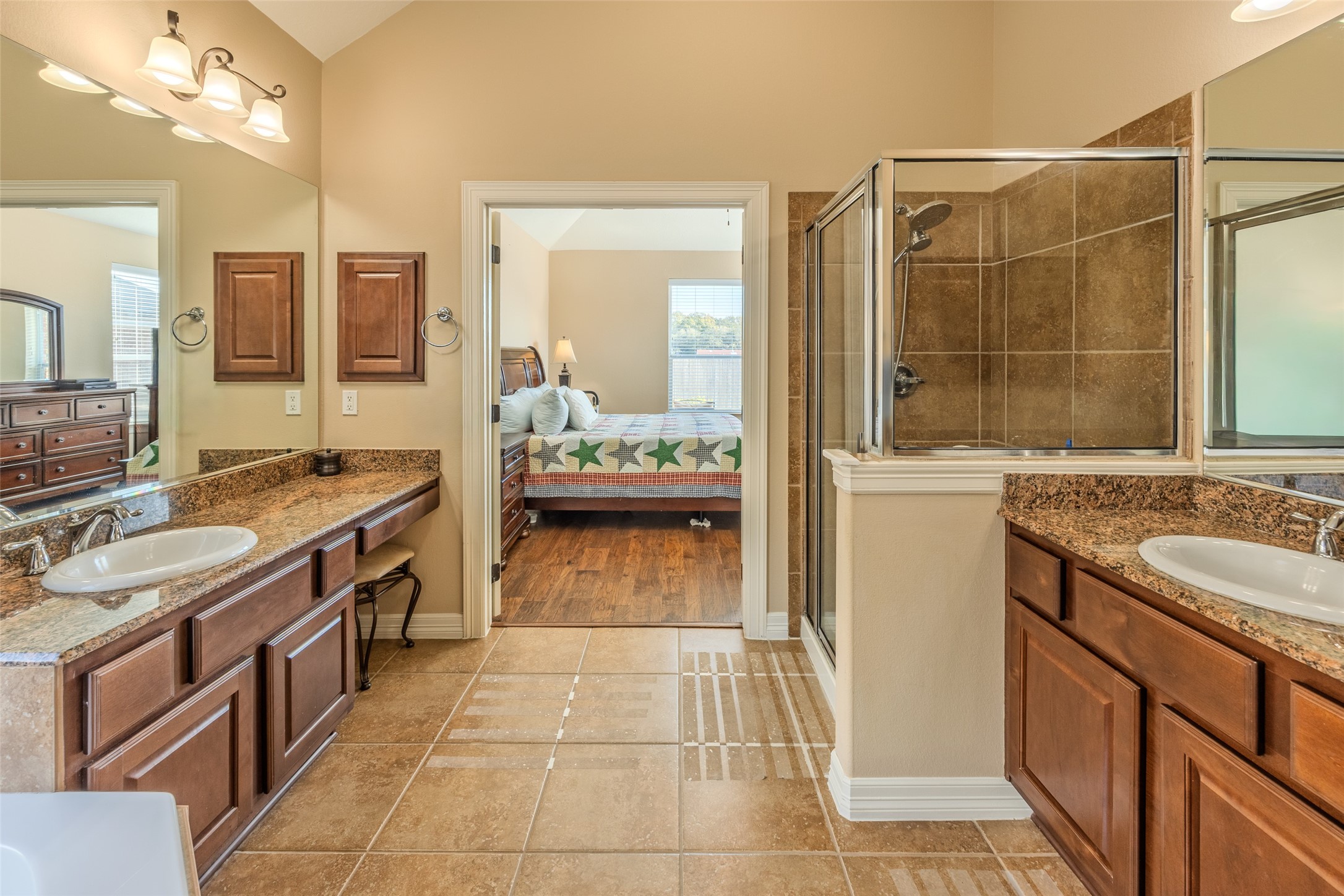 1905 Rosenbaum Drive Brenham, TX 77833 - Photo 20 of 30 a spacious bathroom with a tub sink and mirror