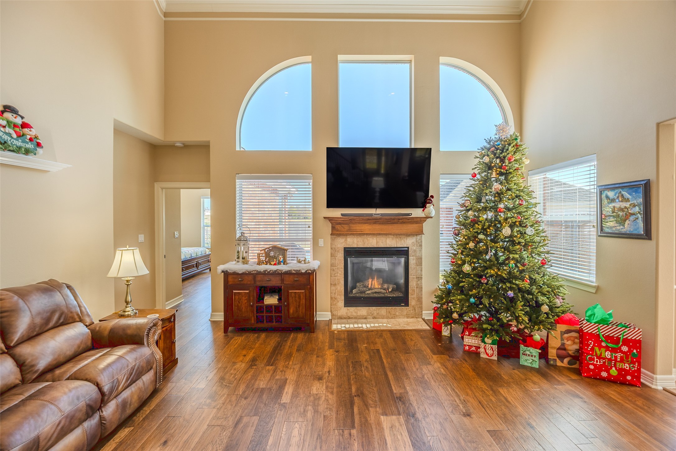 1905 Rosenbaum Drive Brenham, TX 77833 - Photo 2 of 30 a living room with furniture fireplace and flat screen tv