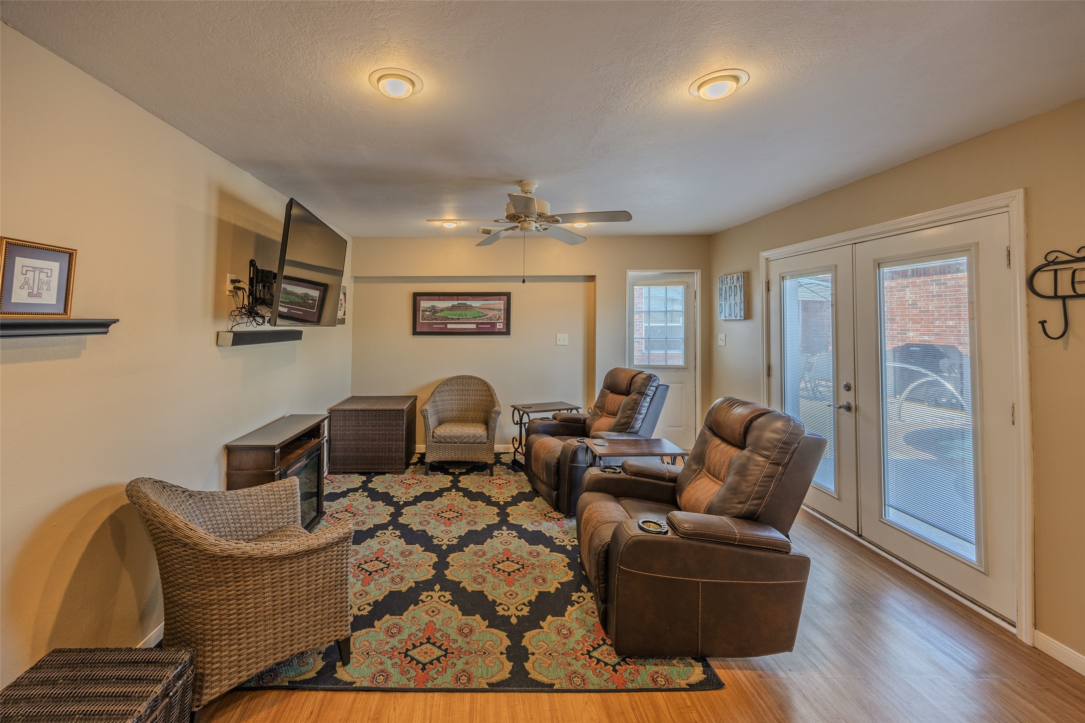 1905 Rosenbaum Drive Brenham, TX 77833 - Photo 29 of 30 a living room with furniture and a ceiling fan