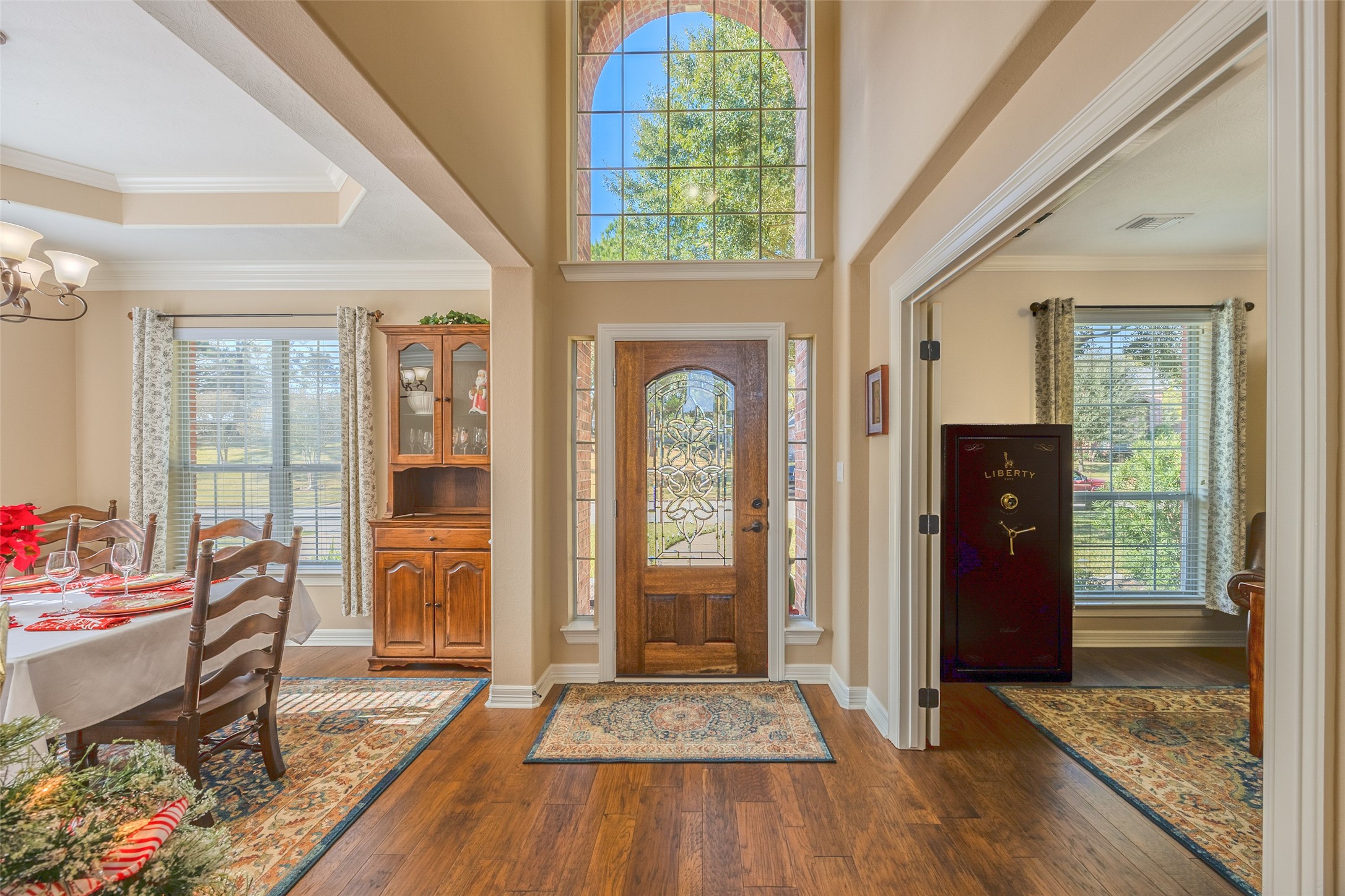 1905 Rosenbaum Drive Brenham, TX 77833 - Photo 7 of 30 a view of an entryway with wooden floor and front door