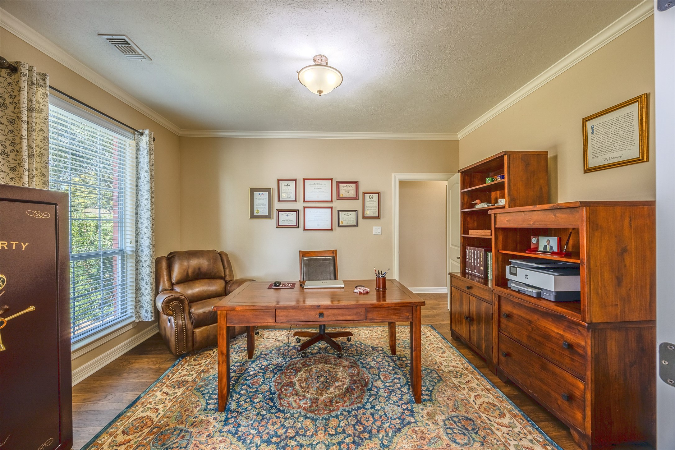 1905 Rosenbaum Drive Brenham, TX 77833 - Photo 10 of 30 a view of a workspace with furniture and a window