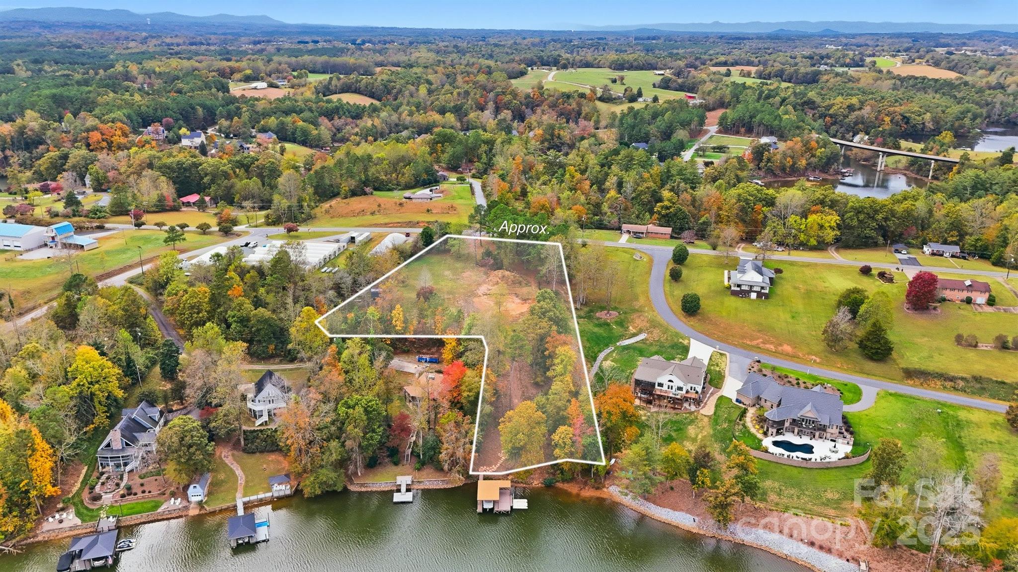 5411 Icard Ridge Road Hickory, NC 28601 - Photo 2 of 26 an aerial view of residential houses with outdoor space