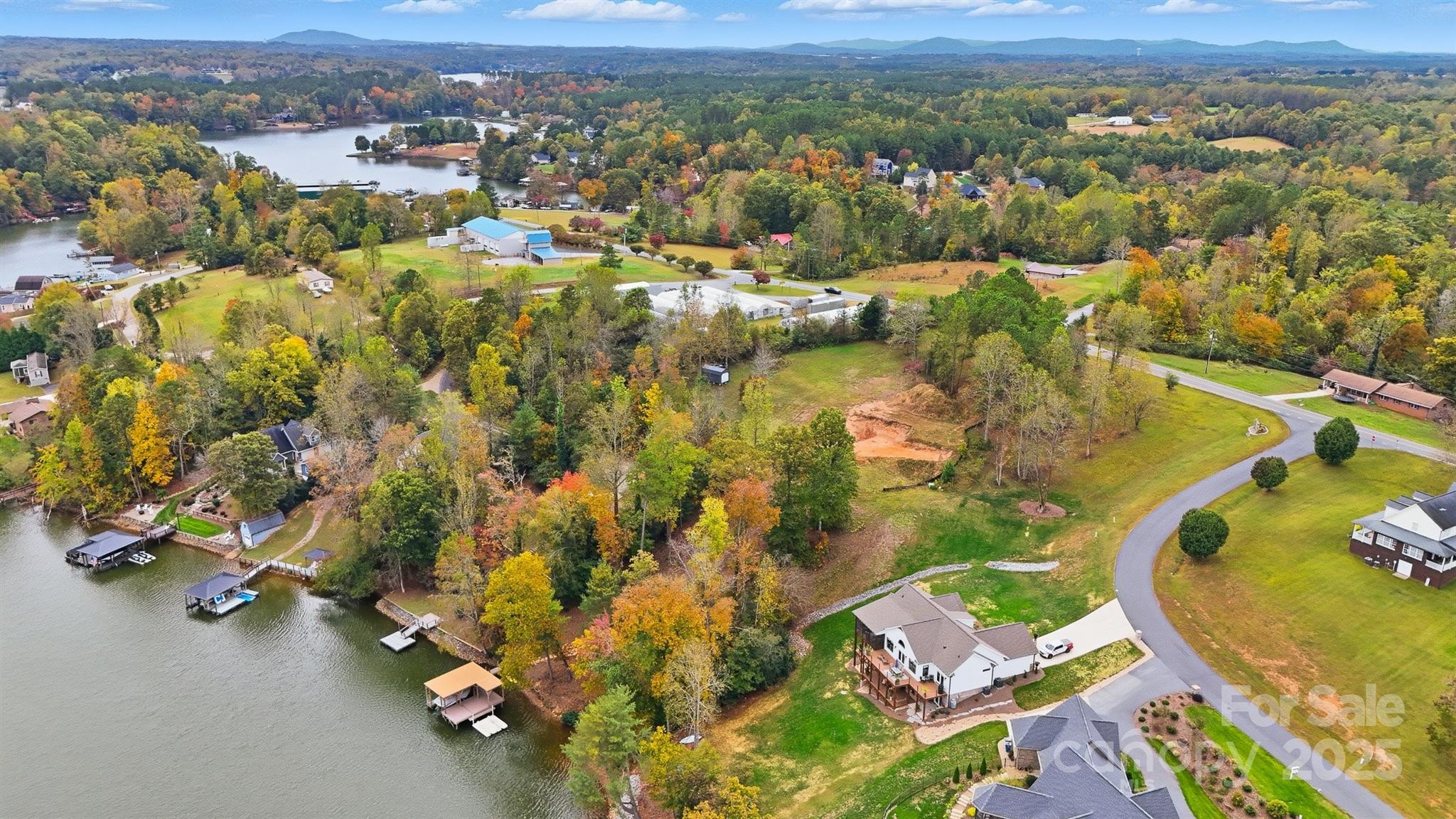 5411 Icard Ridge Road Hickory, NC 28601 - Photo 24 of 26 an aerial view of residential houses with outdoor space