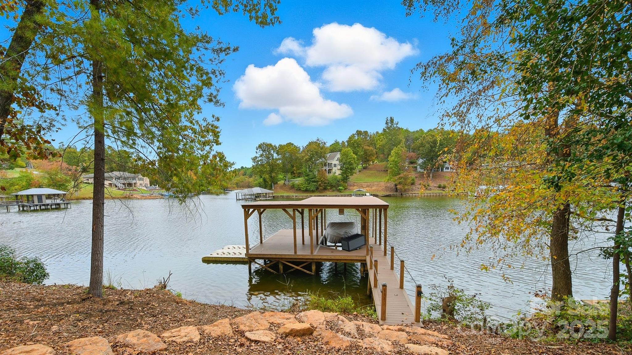 5411 Icard Ridge Road Hickory, NC 28601 - Photo 9 of 26 a backyard of a house with table and chairs