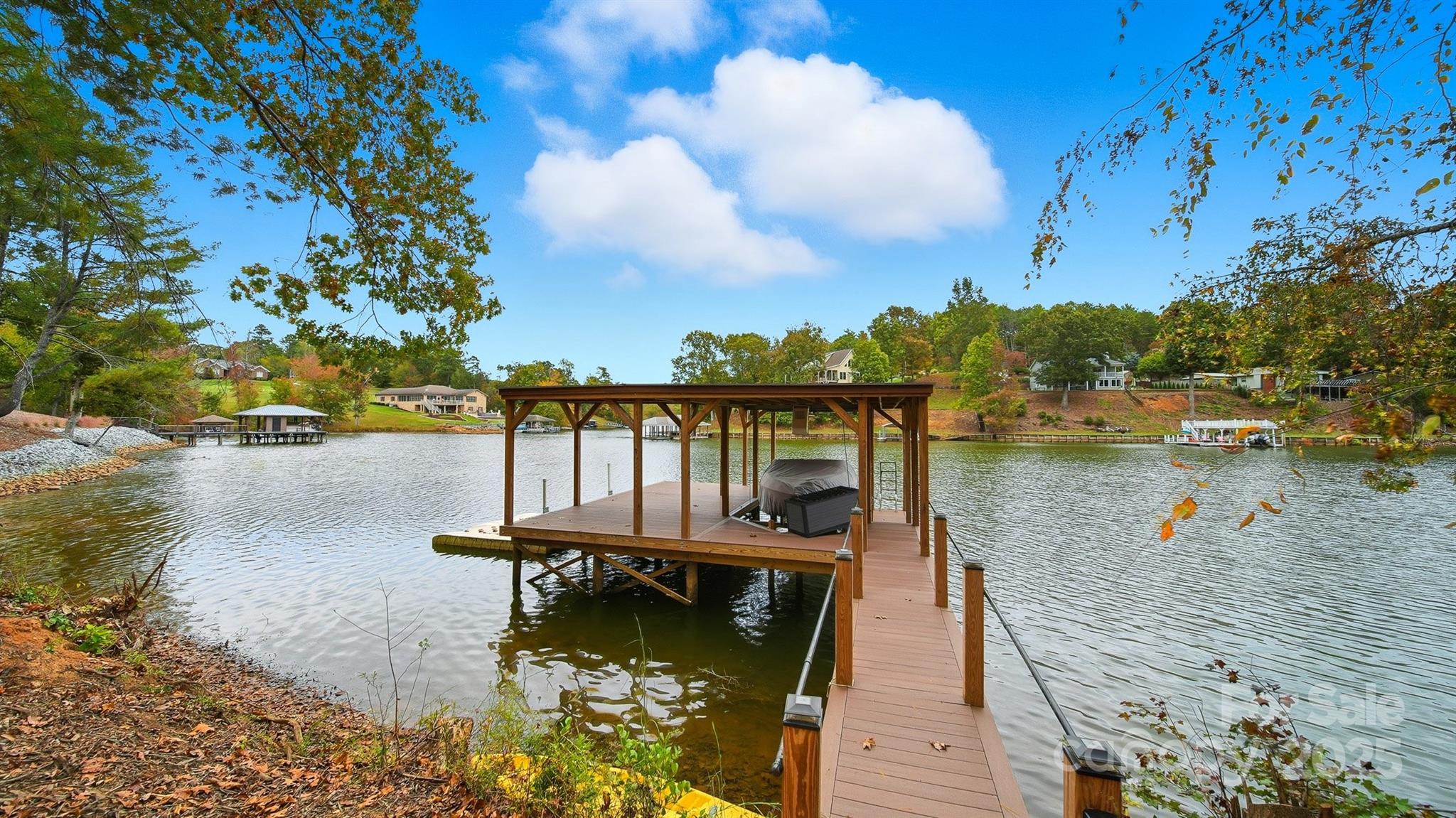 5411 Icard Ridge Road Hickory, NC 28601 - Photo 10 of 26 a view of a lake with boats and trees in the background