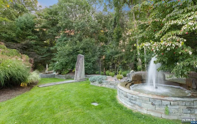 a garden view with a seating space