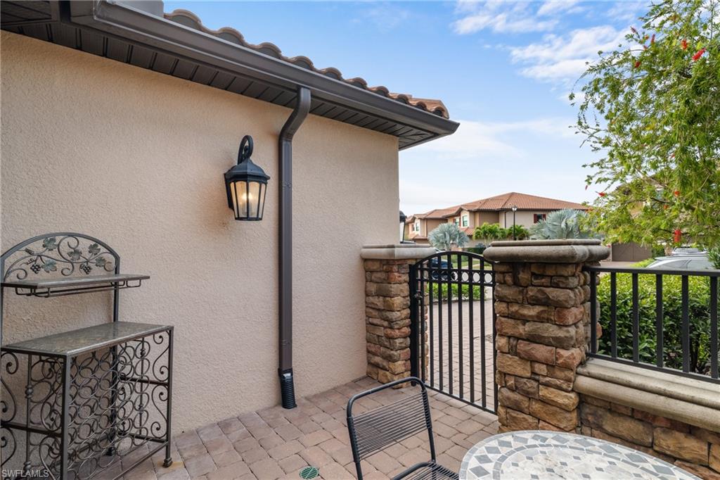 9637 Montelanico Loop, Unit 104 Naples, FL 34119 - Photo 23 of 45 View of balcony