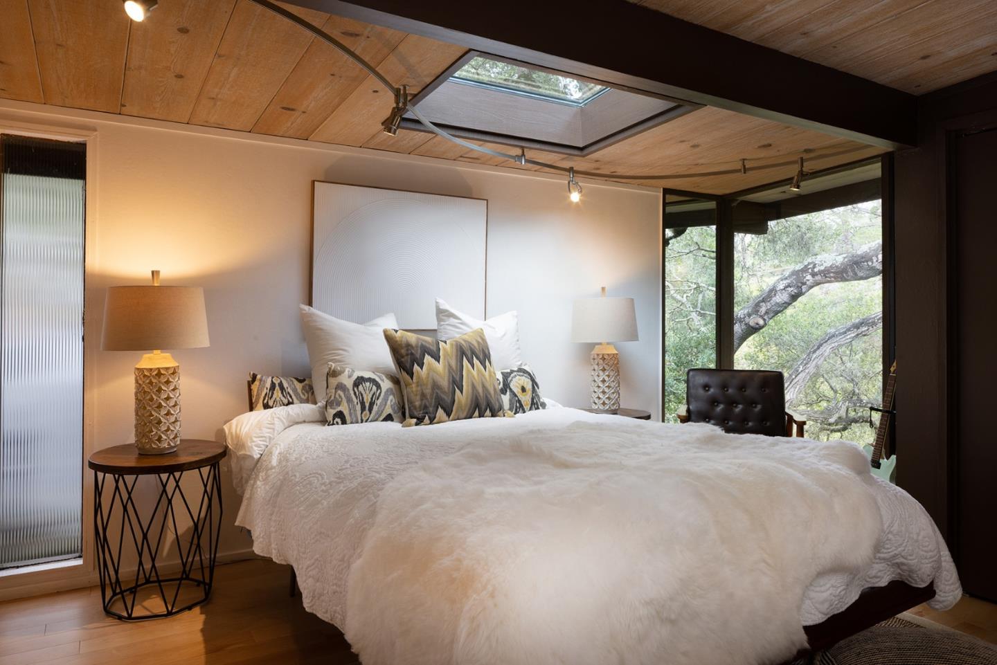 4145 Segunda Drive Carmel, CA 93923 - Photo 15 of 30 a bedroom with a large bed and a window